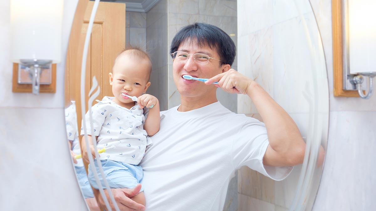 asian-father-teaching-kid-teeth-brushing.jpg